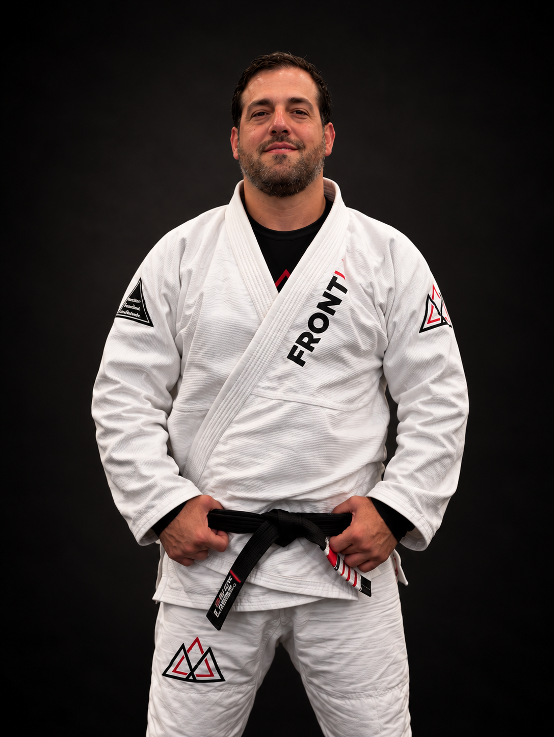 Ricardo Moreira in a white Frontline gi with a black belt